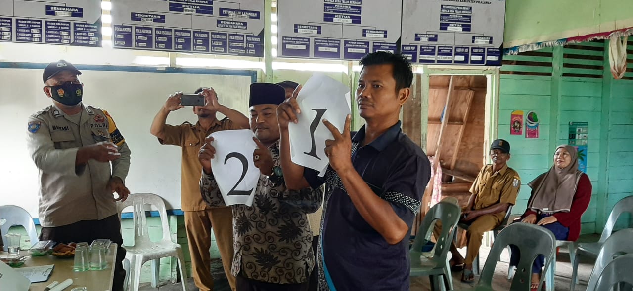 Polsek Kuala Kampar Ikuti Rapat Panitia Pilkades Teluk Beringin